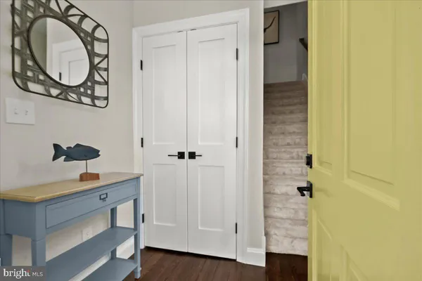 a kitchen with a stove a sink and a refrigerator