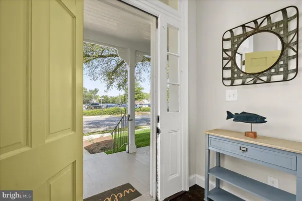 a kitchen with cabinets stainless steel appliances and a sink