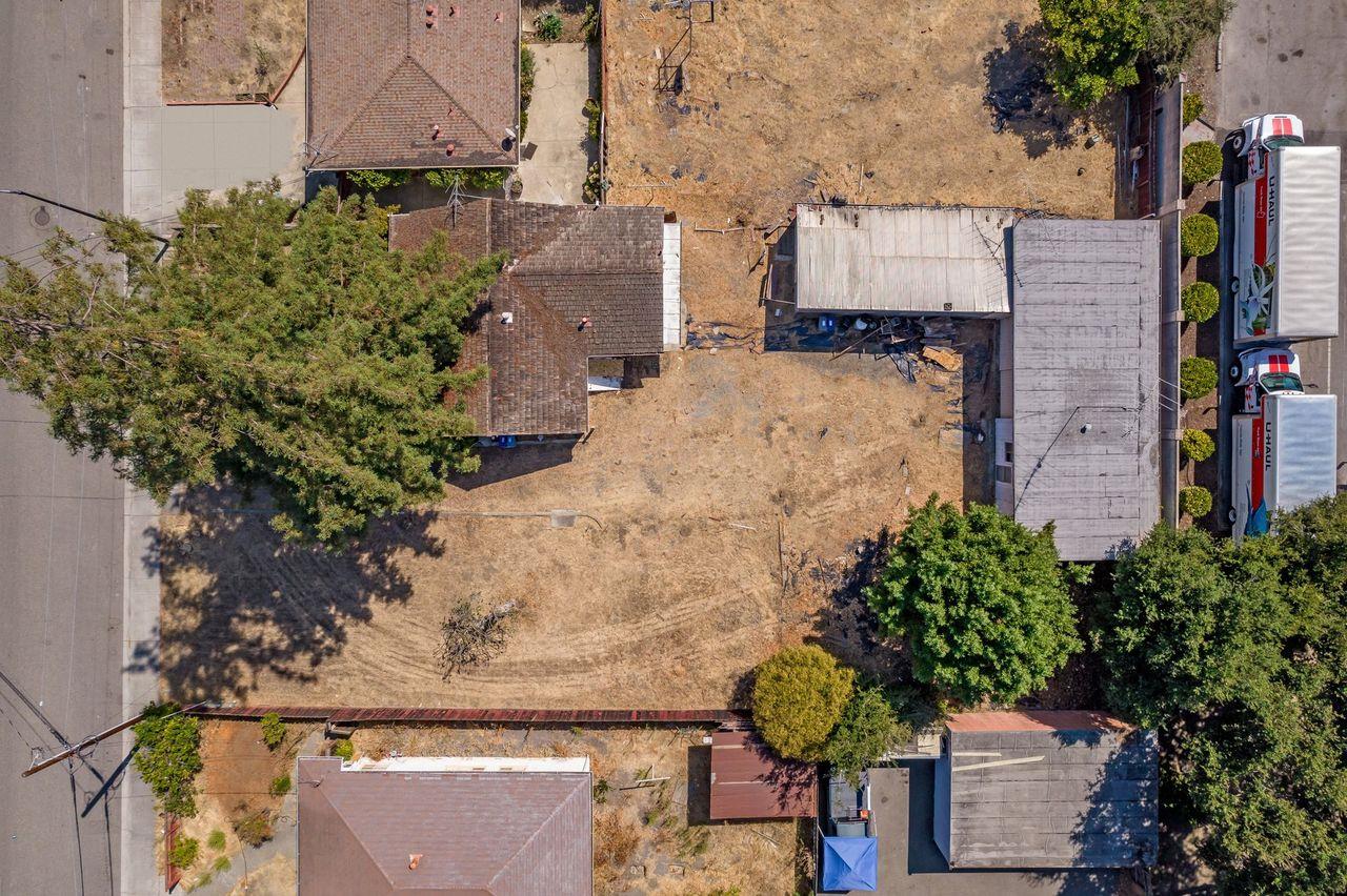 89 Centre Street Mountain View, CA 94041 - Photo 8 of 31 an aerial view of a house with a yard and large tree