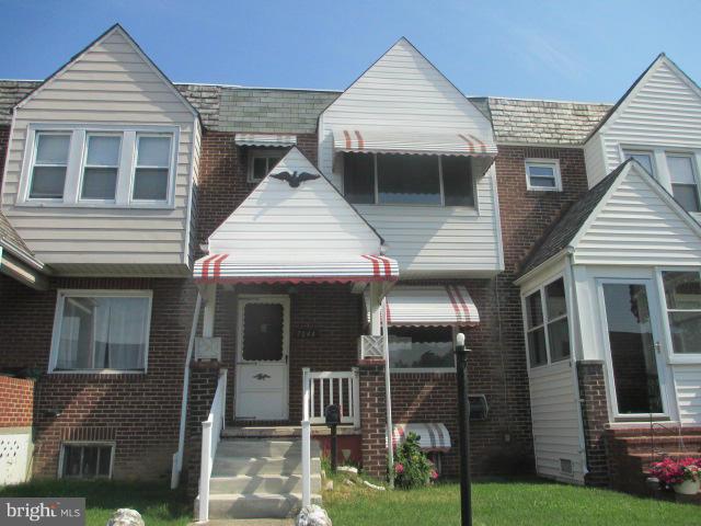 7044 Belclare Road Baltimore, MD 21222 - Photo 1 of 8 a view of house with yard