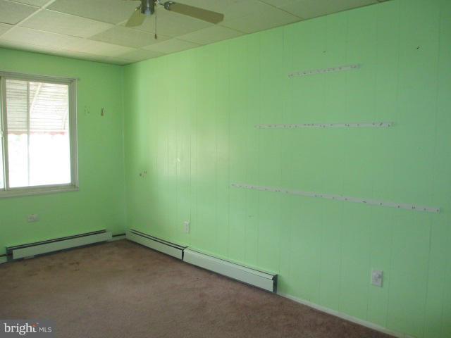 7044 Belclare Road Baltimore, MD 21222 - Photo 5 of 8 a view of a room that has a window