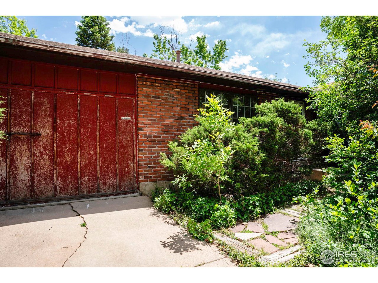 1380 Ithaca Drive Boulder, CO 80305 - Photo 2 of 31 No garage door on One-Car Garage