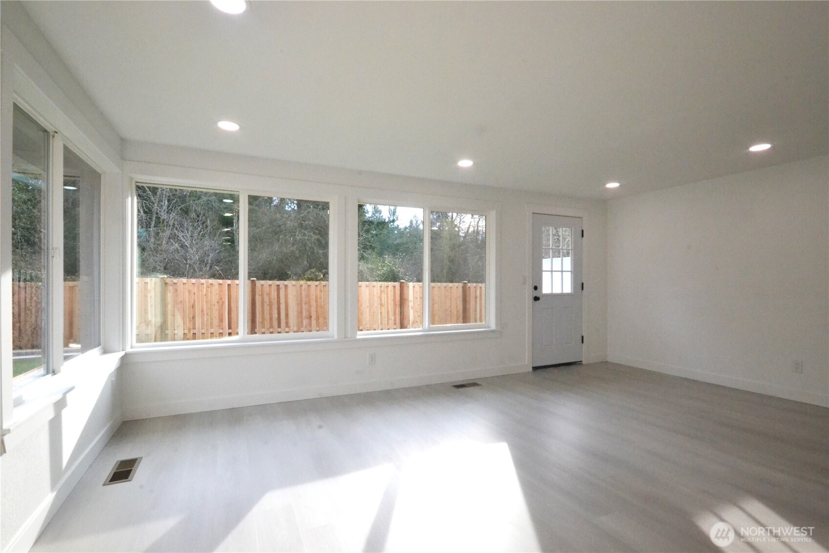 1410 Beech Avenue Steilacoom, WA 98388 - Photo 14 of 38 a view of an empty room with a window