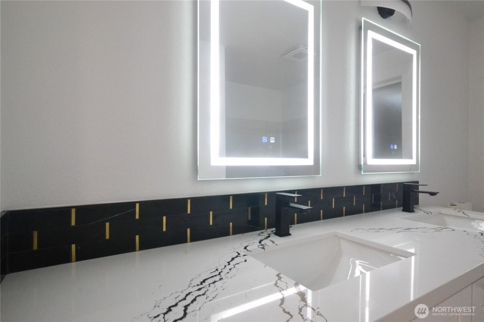 1410 Beech Avenue Steilacoom, WA 98388 - Photo 21 of 38 a kitchen with a sink and cabinets