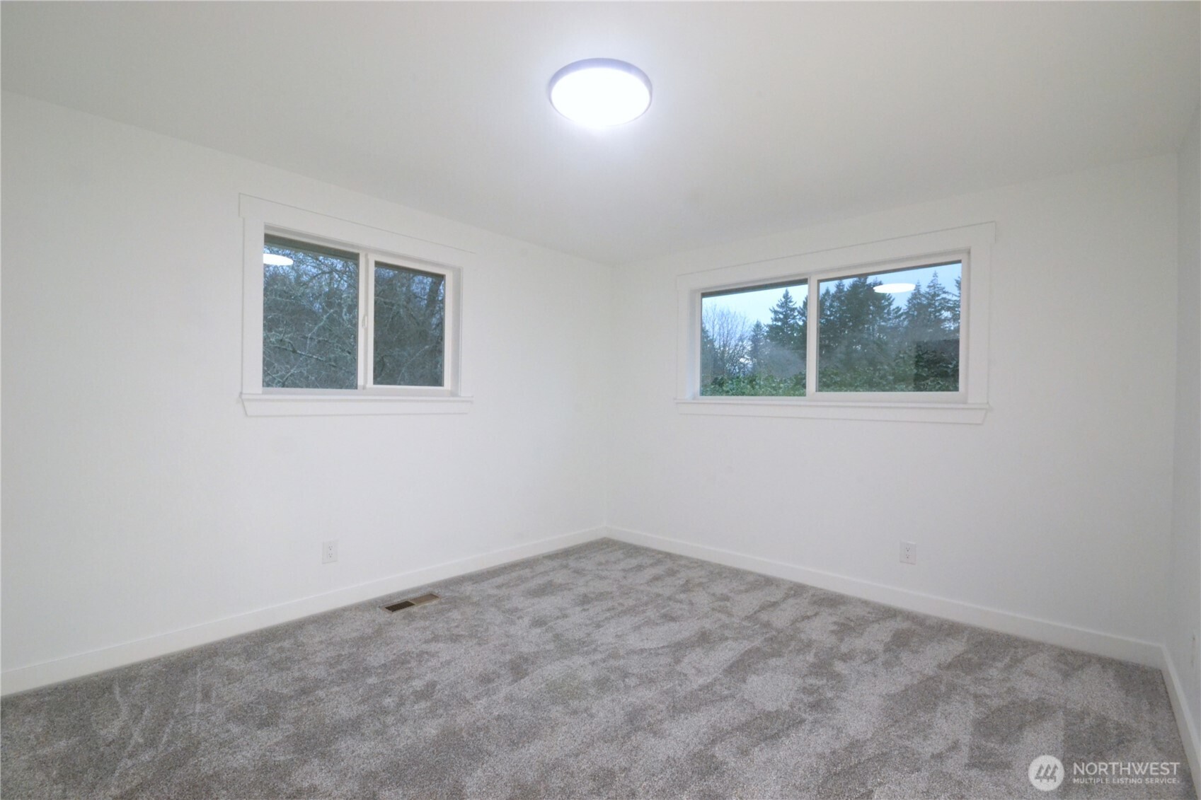1410 Beech Avenue Steilacoom, WA 98388 - Photo 26 of 38 an empty room with a window