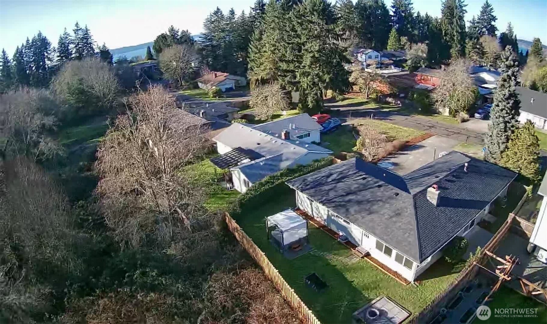 1410 Beech Avenue Steilacoom, WA 98388 - Photo 38 of 38 an aerial view of a house with a garden