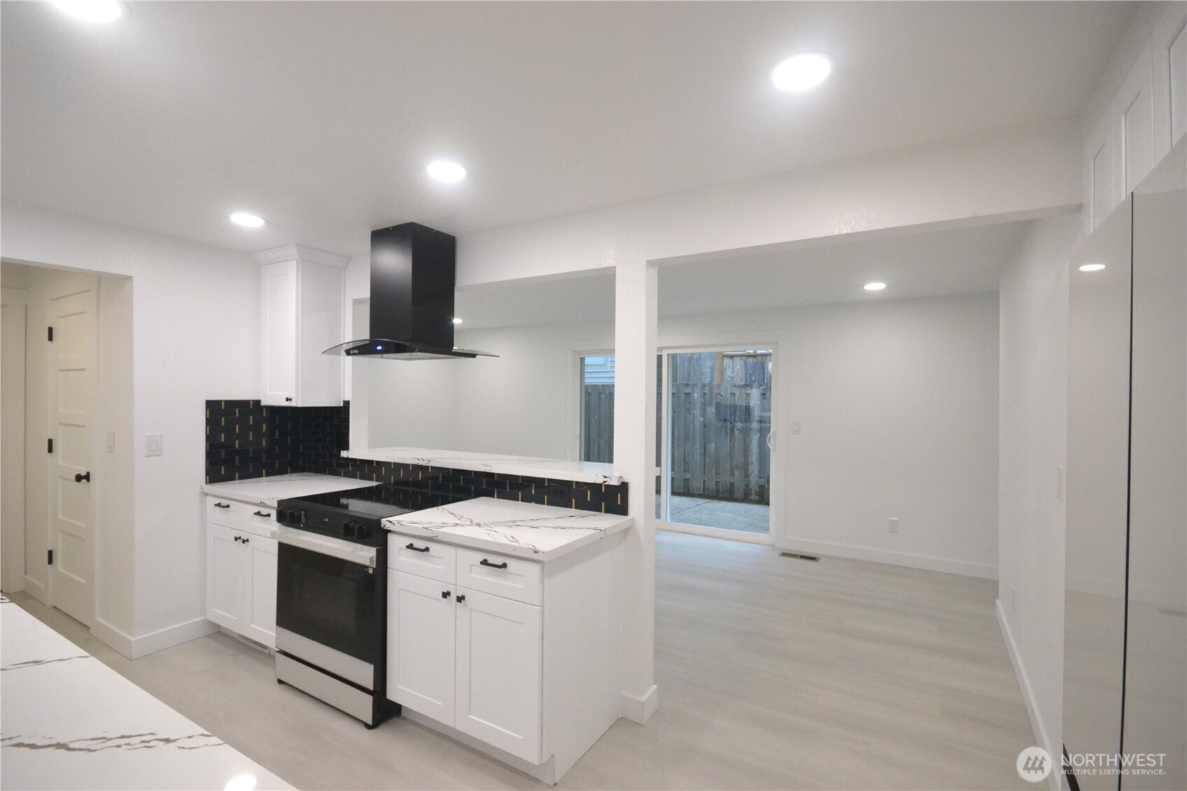 1410 Beech Avenue Steilacoom, WA 98388 - Photo 8 of 38 a kitchen that has a stove and a sink