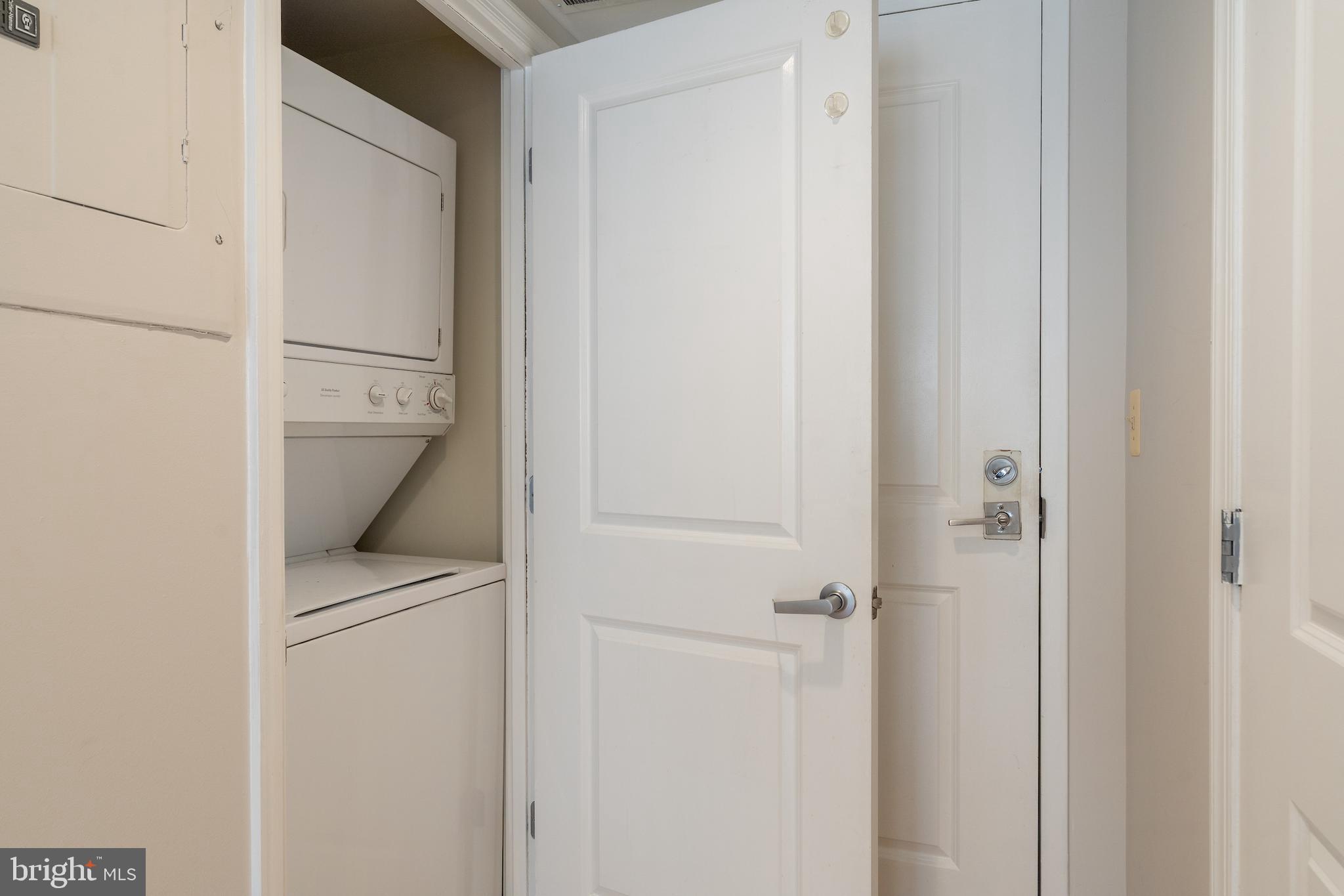 1225 13th Street Northwest, Unit 509 Washington, DC 20005 - Photo 13 of 29 a utility room with dryer and washer
