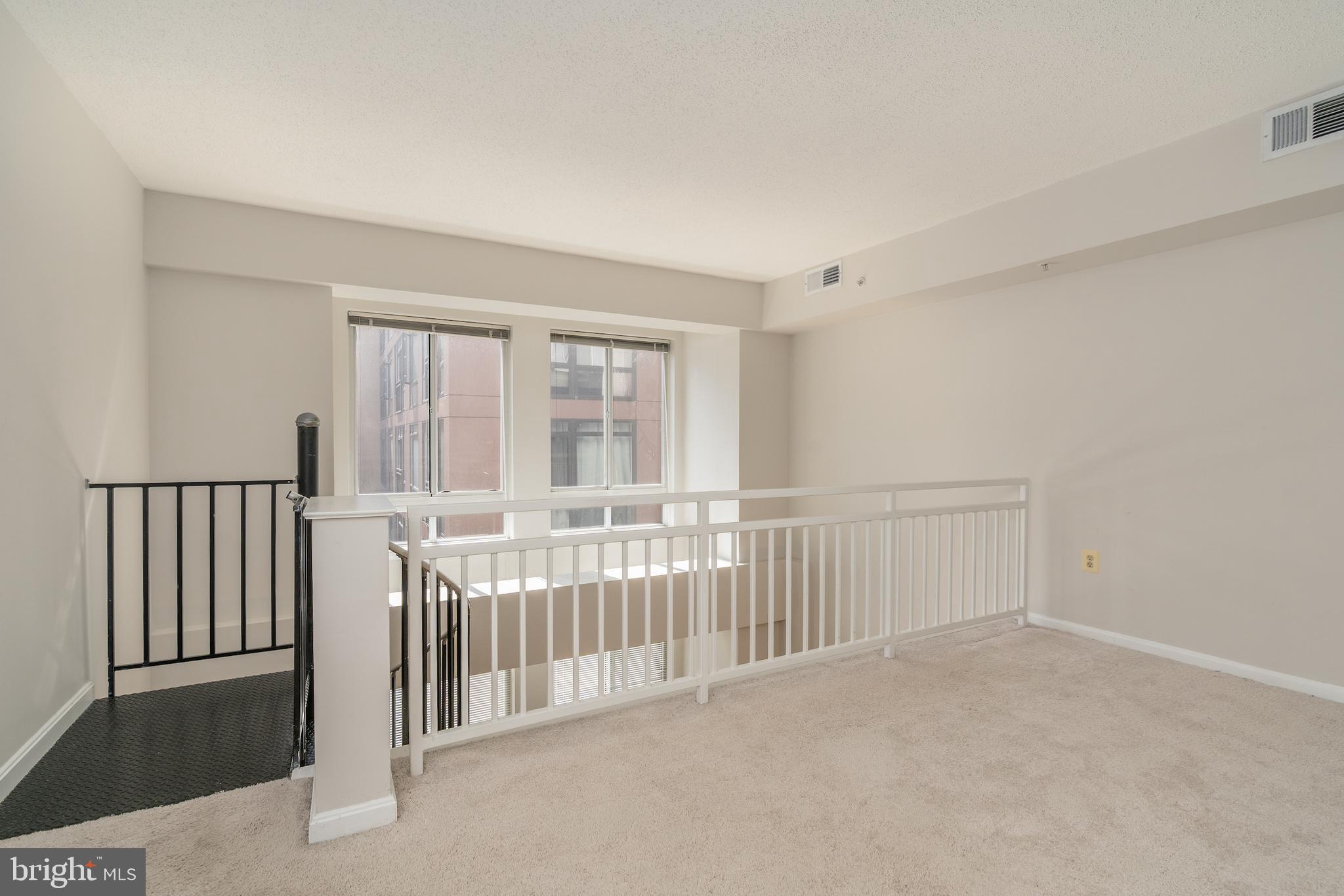 1225 13th Street Northwest, Unit 509 Washington, DC 20005 - Photo 19 of 29 an empty room with entrance