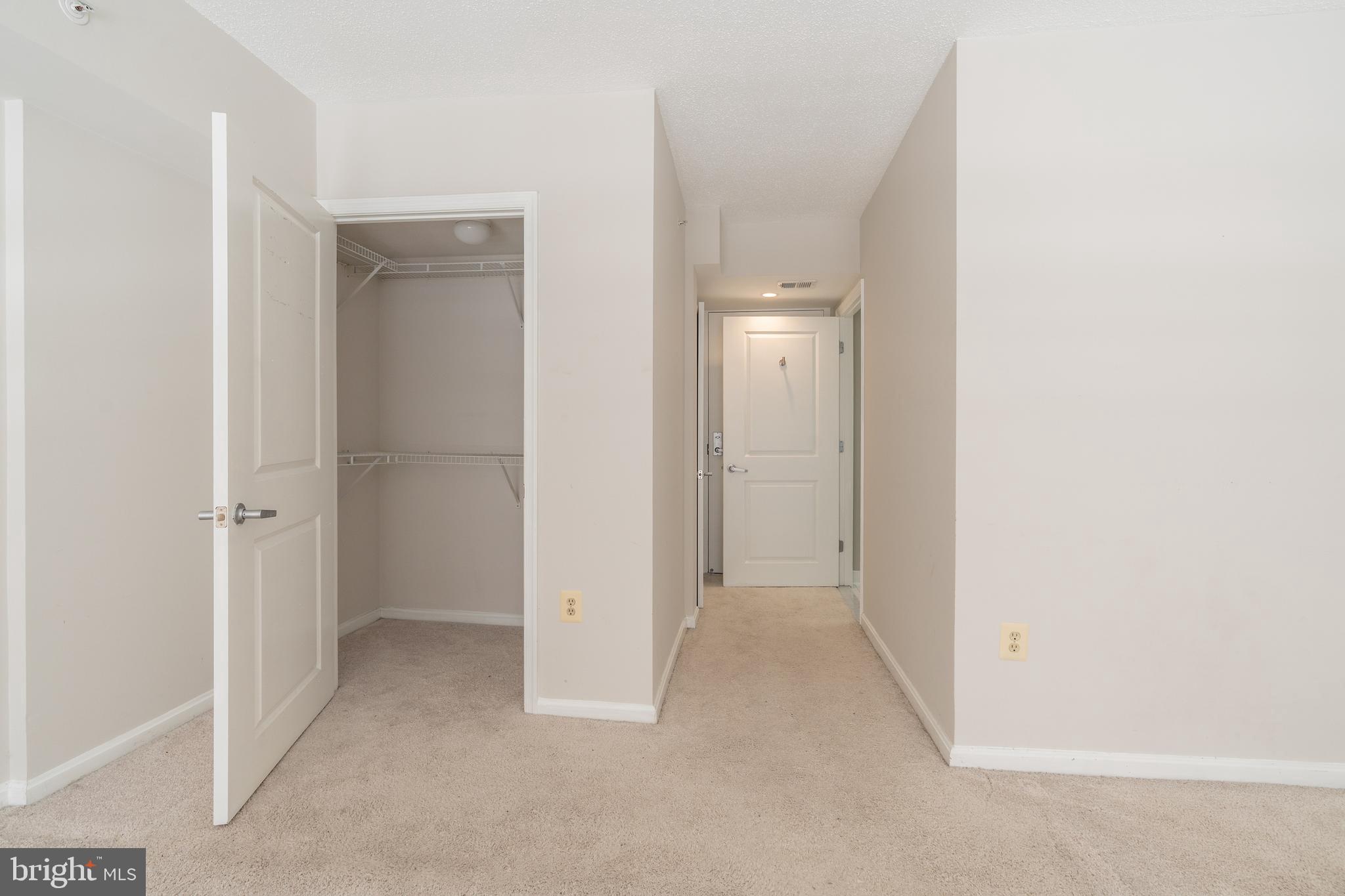 1225 13th Street Northwest, Unit 509 Washington, DC 20005 - Photo 22 of 29 a view of a room with white walls and closet