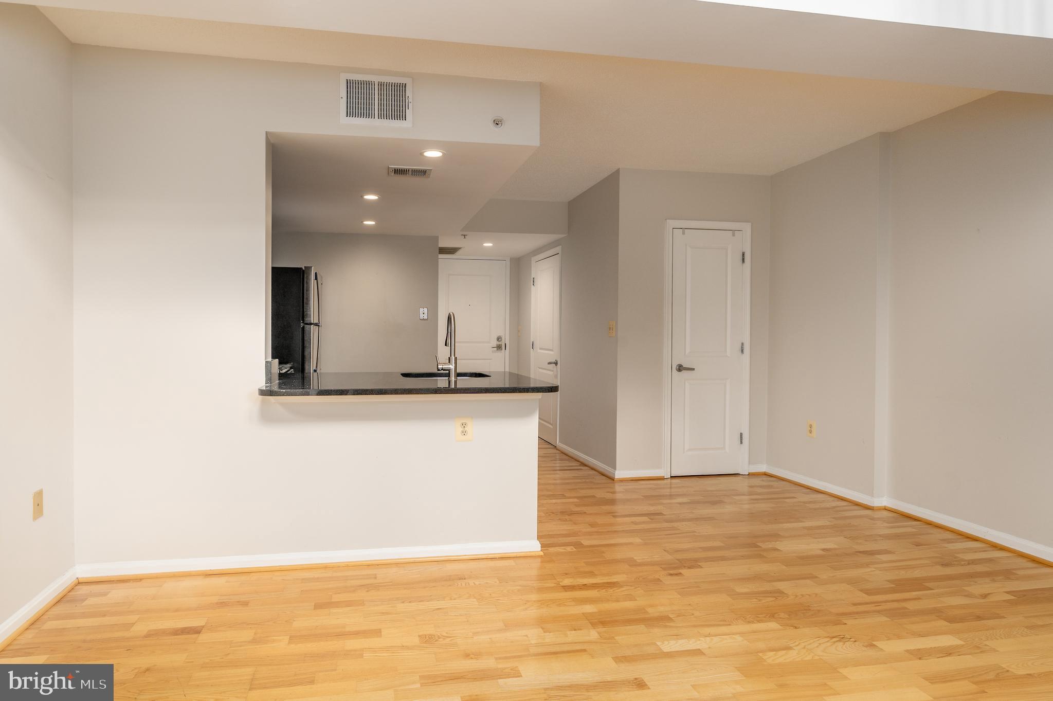 1225 13th Street Northwest, Unit 509 Washington, DC 20005 - Photo 7 of 29 a view of an empty room