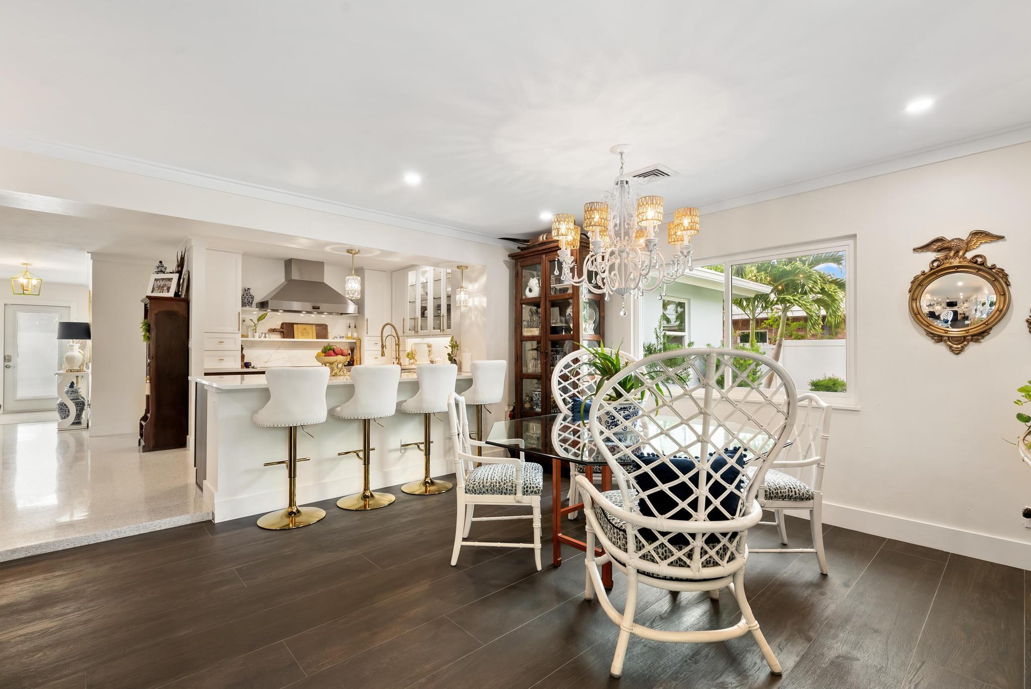 2122 Northridge Road Delray Beach, FL 33444 - Photo 18 of 39 a view of a dining room with furniture and wooden floor