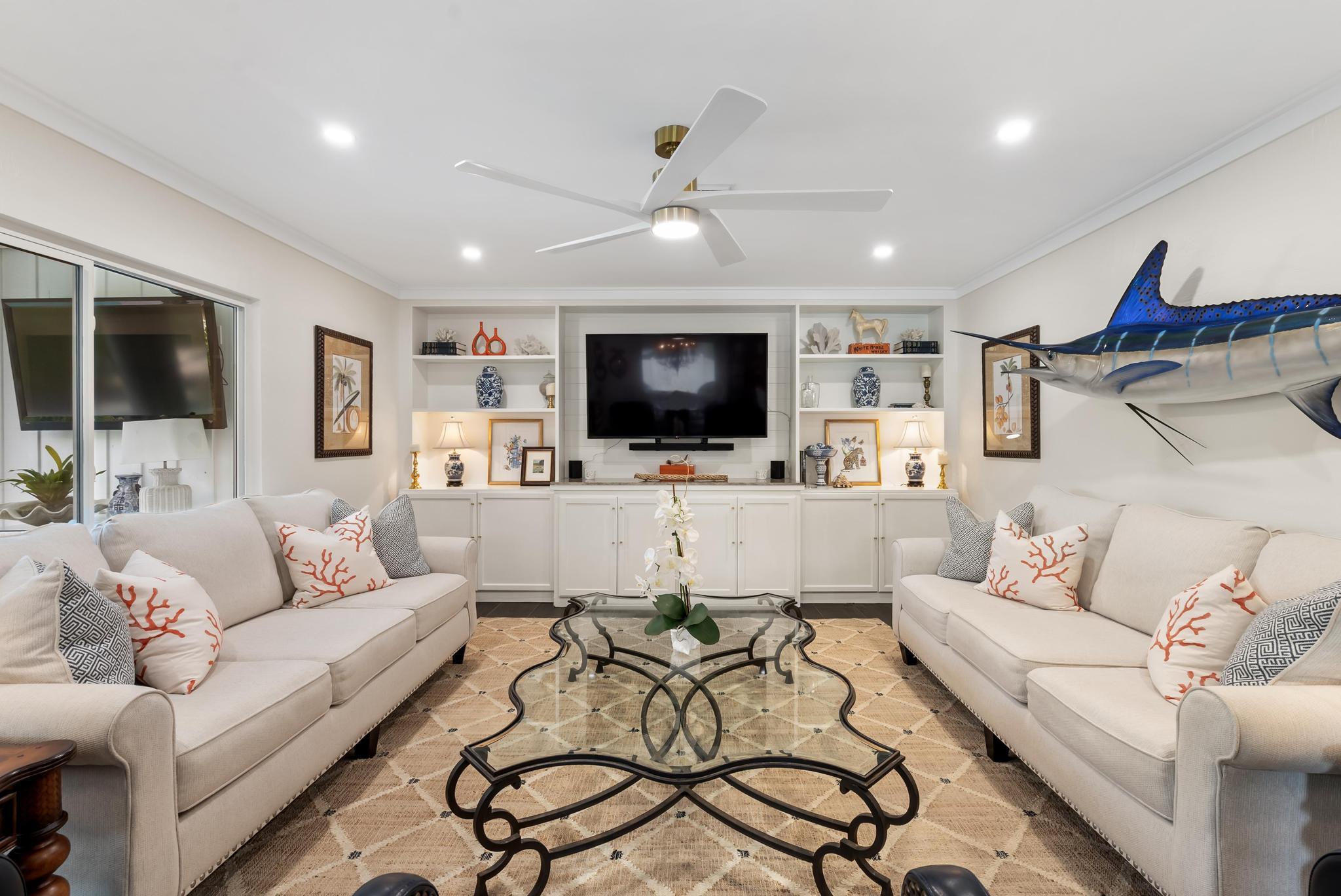 2122 Northridge Road Delray Beach, FL 33444 - Photo 20 of 39 a living room with furniture and a flat screen tv