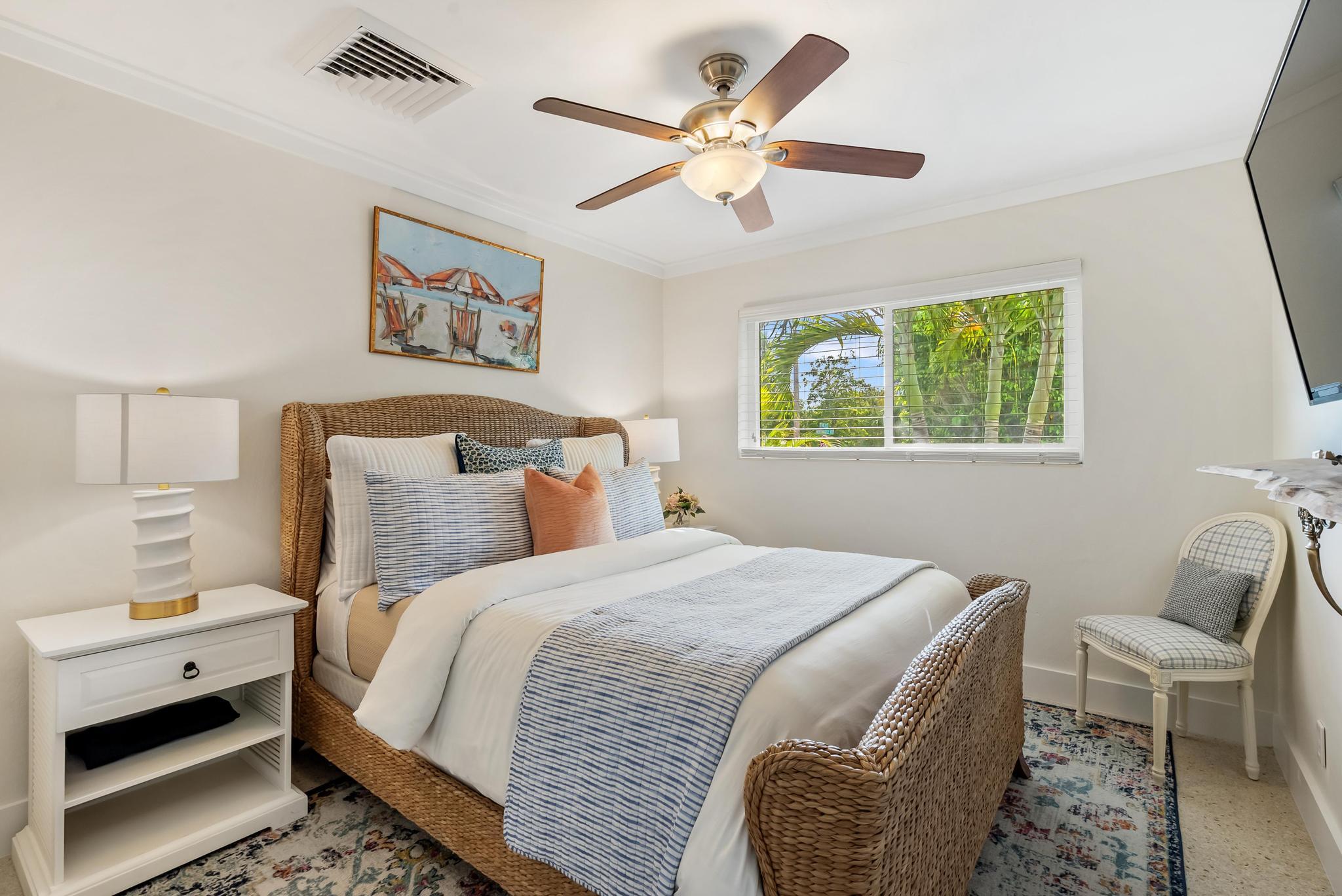 2122 Northridge Road Delray Beach, FL 33444 - Photo 24 of 39 a bedroom with a bed and a chair