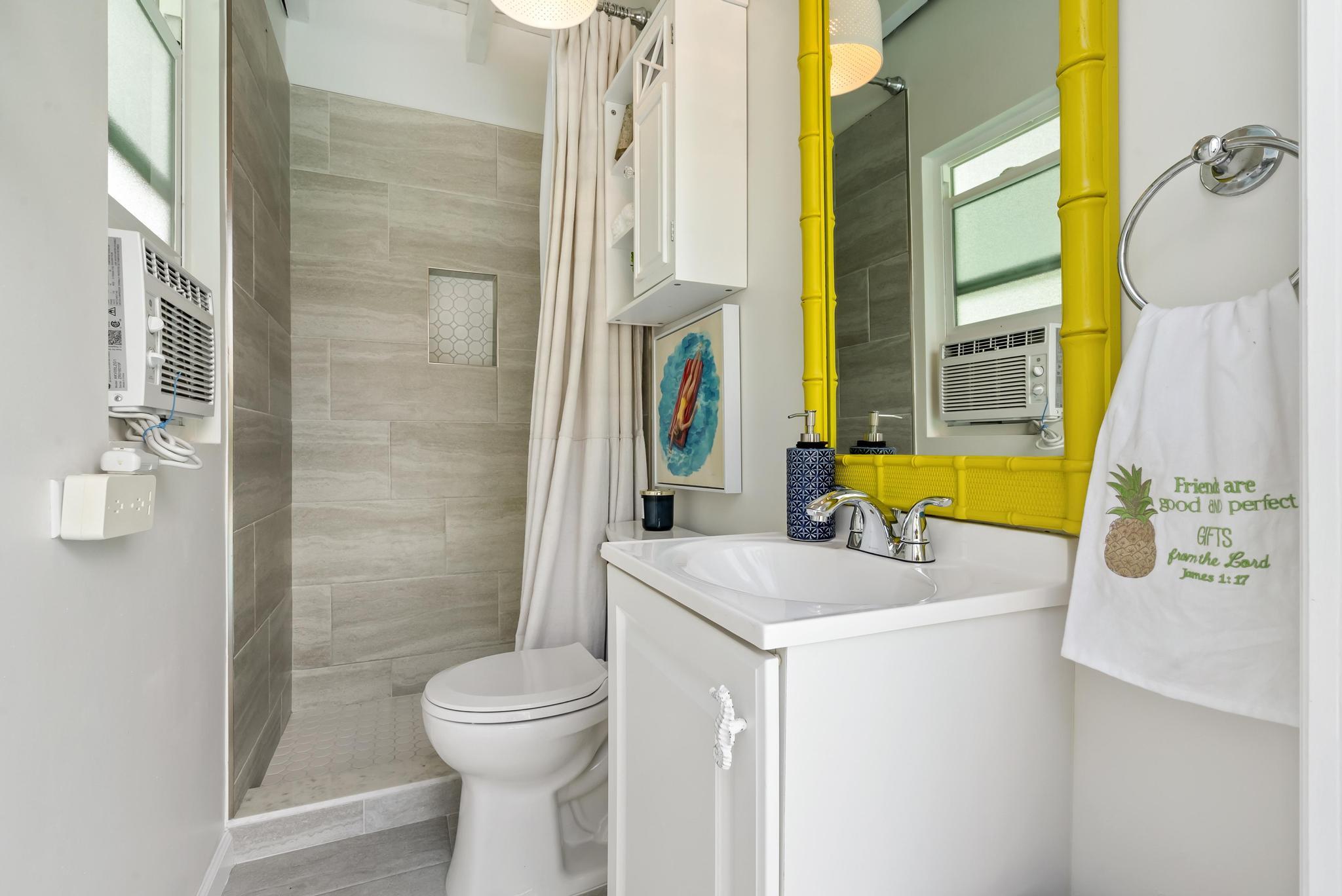 2122 Northridge Road Delray Beach, FL 33444 - Photo 30 of 39 a bathroom with a sink a toilet and shower