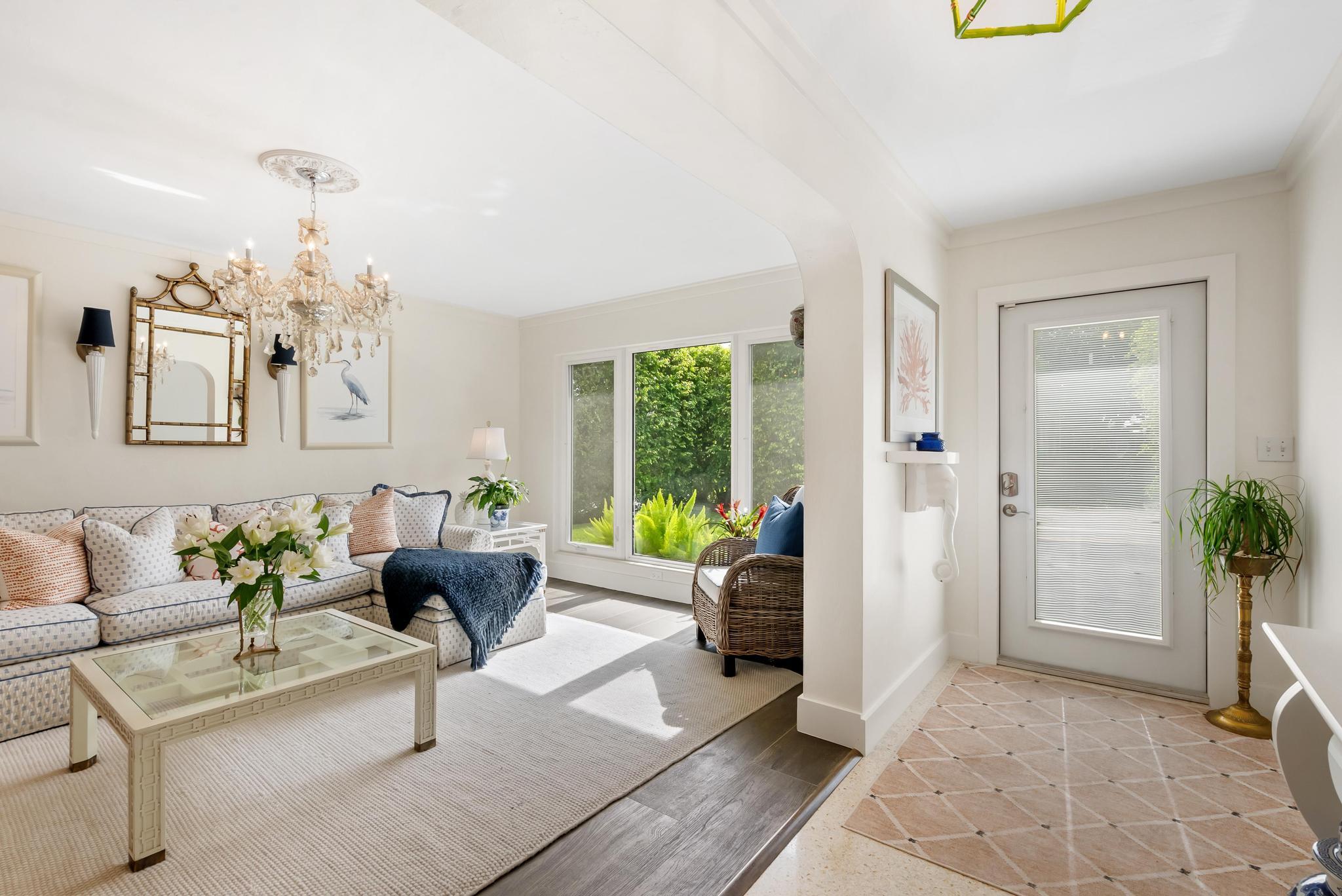 2122 Northridge Road Delray Beach, FL 33444 - Photo 6 of 39 a living room with furniture and a chandelier