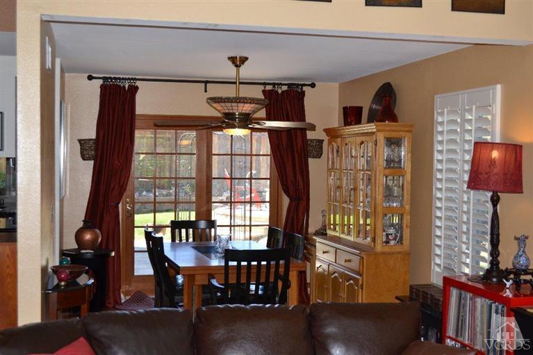 974 Hillview Circle Simi Valley, CA 93065 - Photo 13 of 33 a view of a dining room with furniture and chandelier