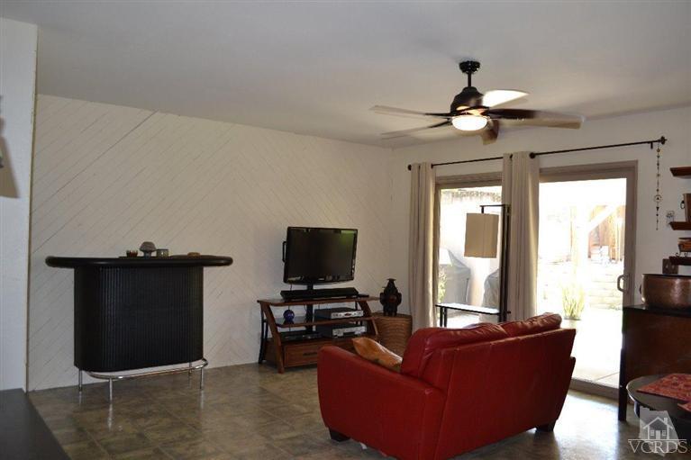 974 Hillview Circle Simi Valley, CA 93065 - Photo 15 of 33 a living room with furniture and a flat screen tv