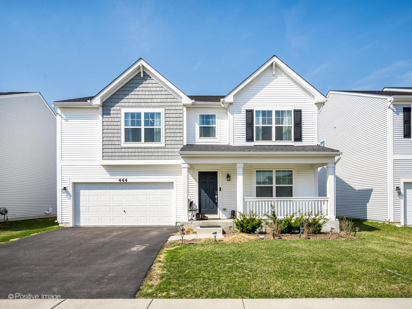 444 Radcliff Lane South Elgin, IL 60177 - Photo 2 of 26 a front view of a house with a yard and garage