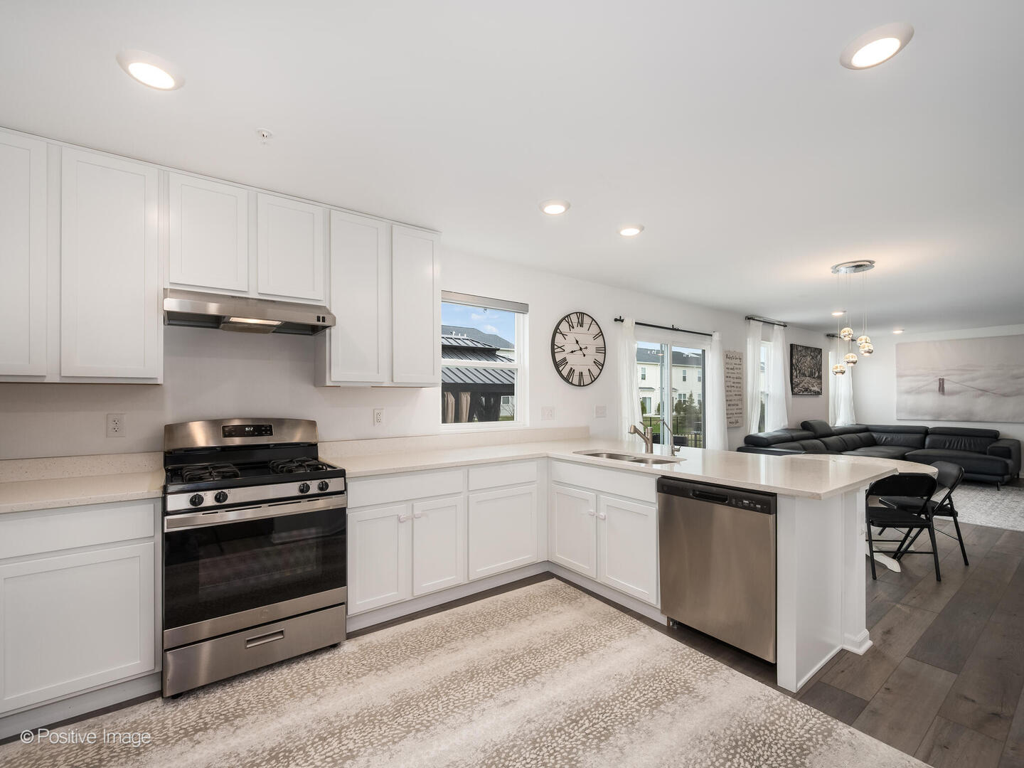 444 Radcliff Lane South Elgin, IL 60177 - Photo 10 of 26 a kitchen with white cabinets and stainless steel appliances