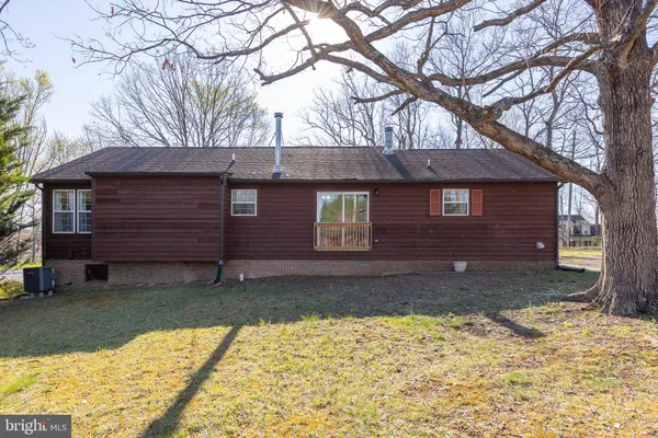 a view of a yard with an outdoor space