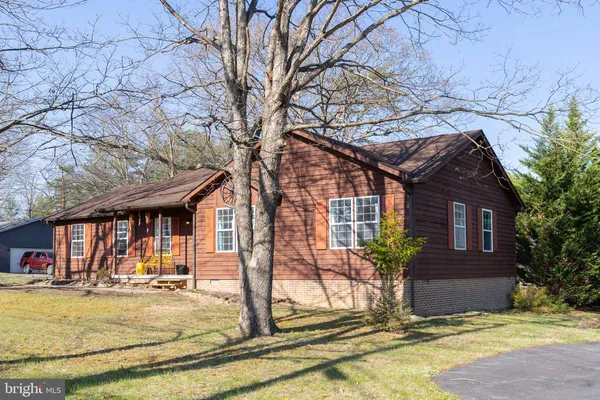 a workspace with furniture and window