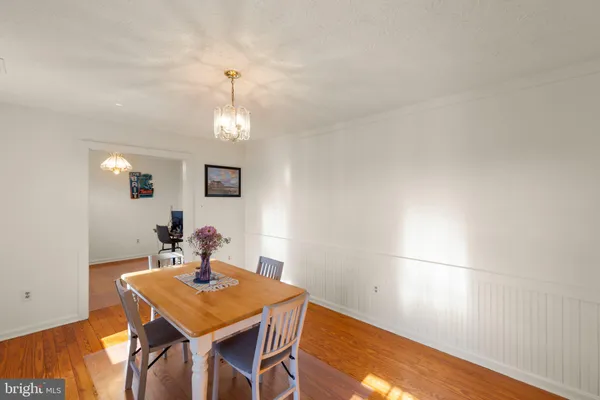 a kitchen with a sink stove and refrigerator
