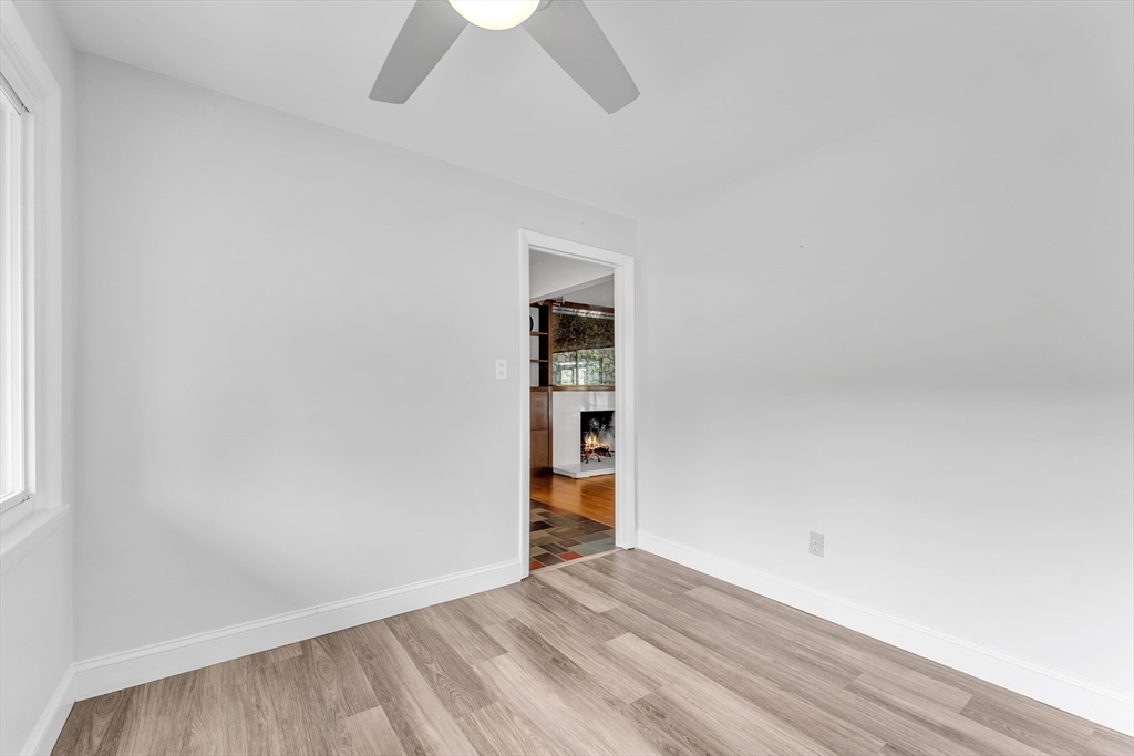 1127 East Street North Suffield, CT 06078 - Photo 18 of 40 an empty room with closet and windows