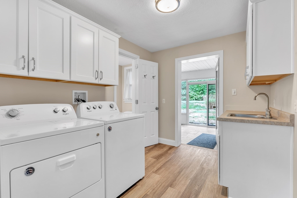 1127 East Street North Suffield, CT 06078 - Photo 29 of 40 a room with a sink a bed and a window