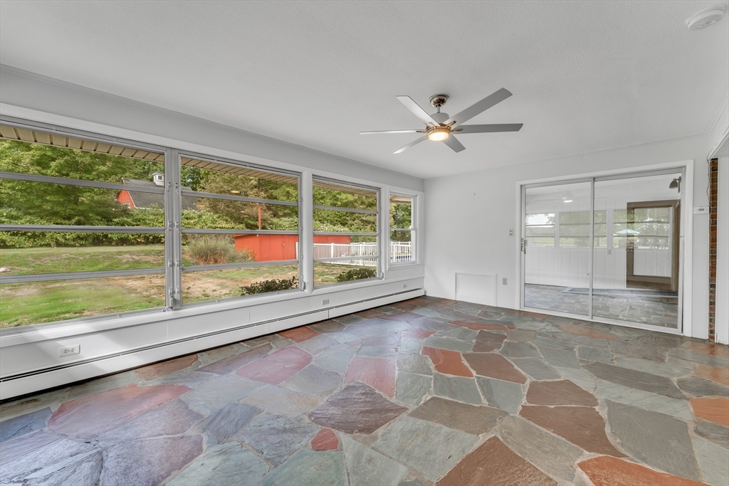 1127 East Street North Suffield, CT 06078 - Photo 33 of 40 wooden floor in an empty room with a window