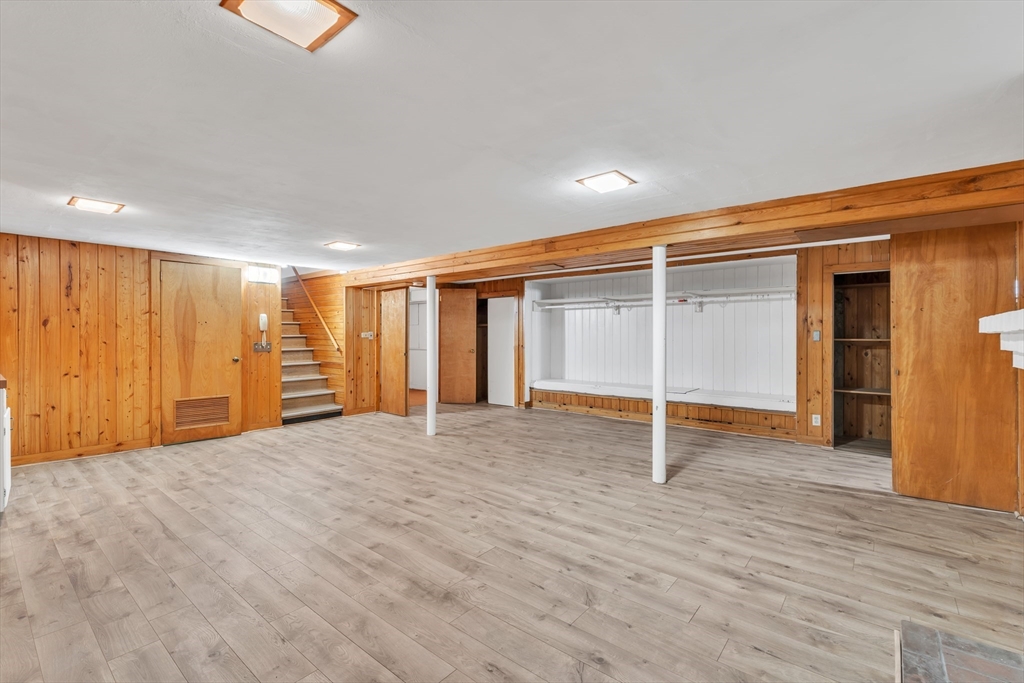 1127 East Street North Suffield, CT 06078 - Photo 37 of 40 a view of an empty room with wooden floor