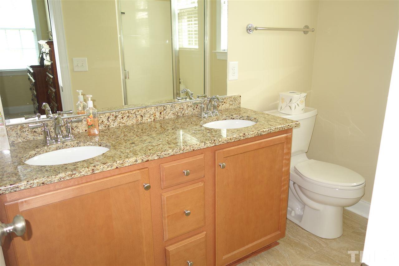 63 West Waycliff Road Henderson, NC 27537 - Photo 13 of 24 Master Bath with granite countertop and tiled floor
