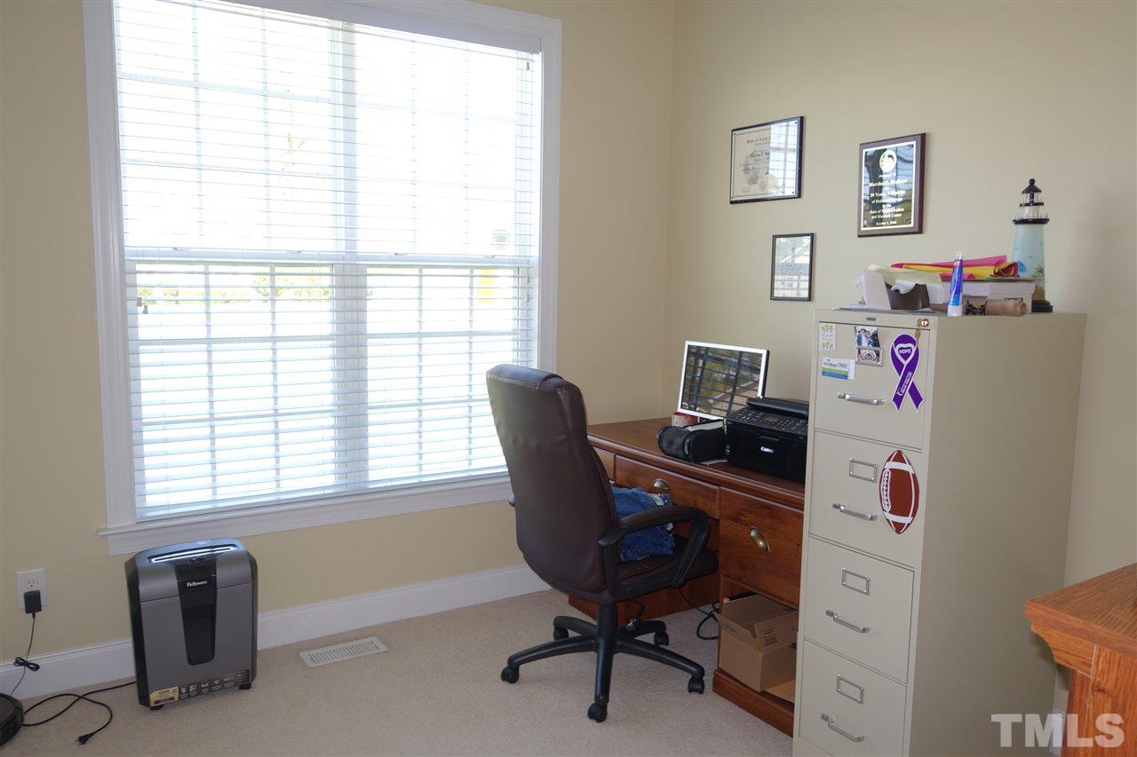 63 West Waycliff Road Henderson, NC 27537 - Photo 19 of 24 The third bedroom is being used presently as an office.