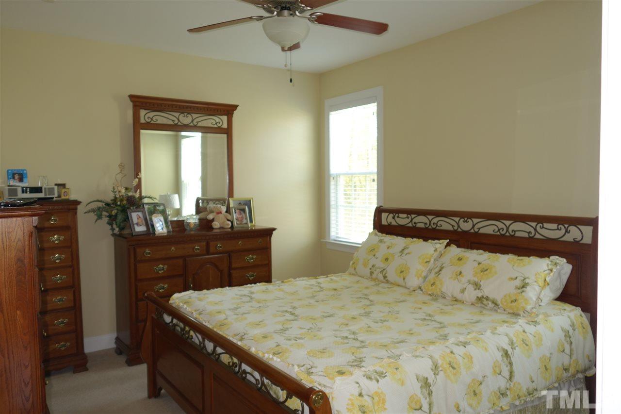 63 West Waycliff Road Henderson, NC 27537 - Photo 10 of 24 Master bedroom with wood flooring