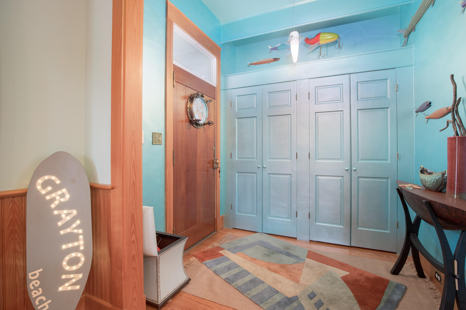 473 Defuniak Street Santa Rosa Beach, FL 32459 - Photo 12 of 28 a bedroom with a bed and a chandelier