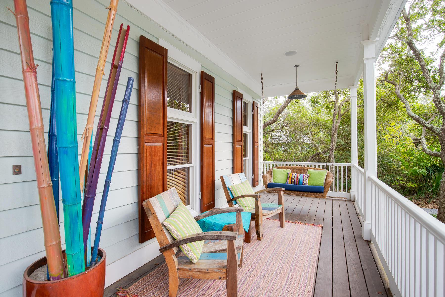 473 Defuniak Street Santa Rosa Beach, FL 32459 - Photo 3 of 28 a view of balcony with chairs and wooden floor