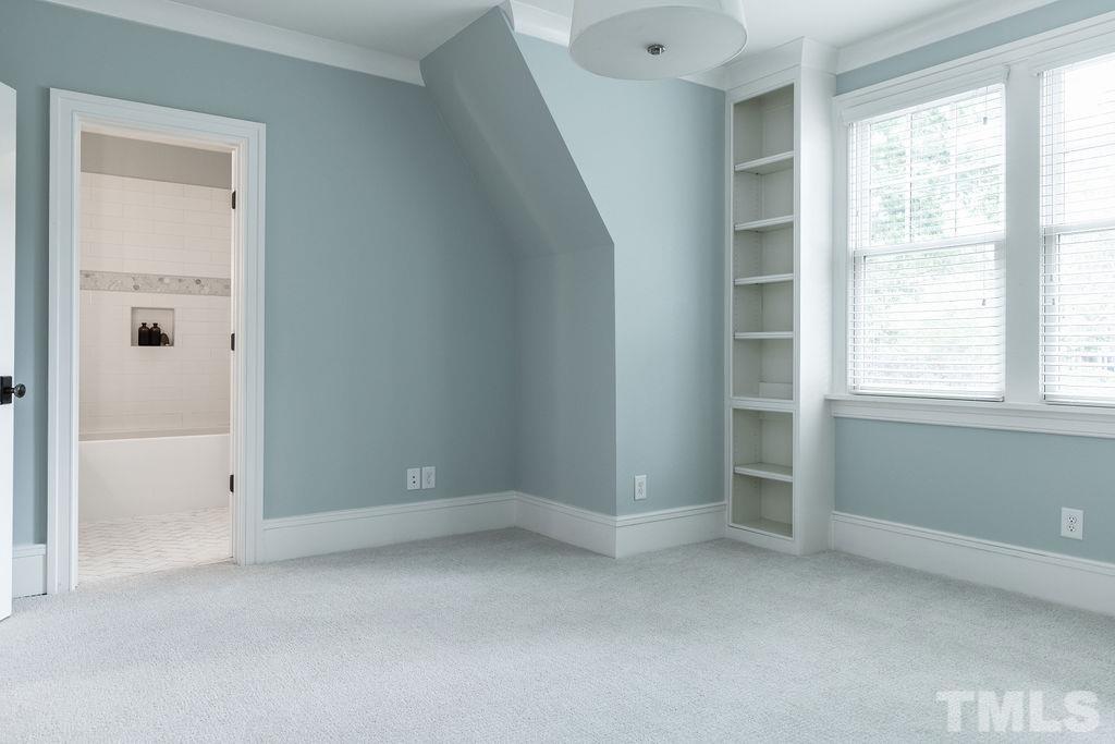 4427 Laurel Hills Road Raleigh, NC 27612 - Photo 68 of 89 an empty room with windows and closet