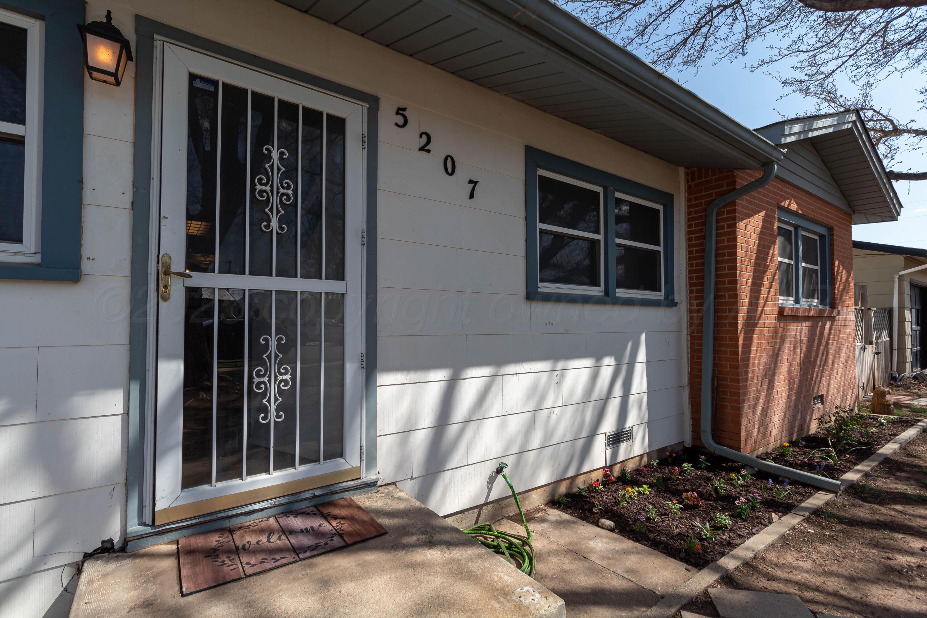 5207 Tumbleweed Drive Amarillo, TX 79110 - Photo 2 of 19 a view of front door