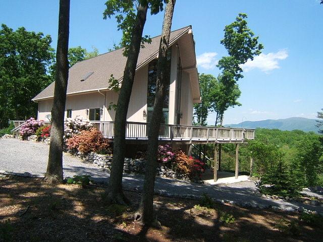 1241 Chester Lane Blue Ridge, VA 24064 - Photo 1 of 7 a backyard of a house with lots of green space