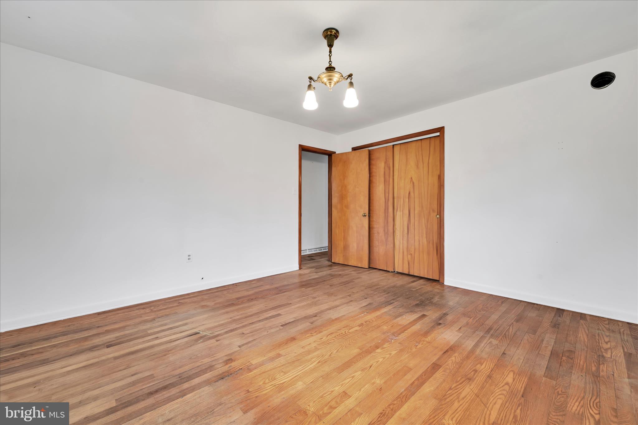 444 North Heidelberg Road Robesonia, PA 19551 - Photo 21 of 59 a view of an empty room with wooden floor