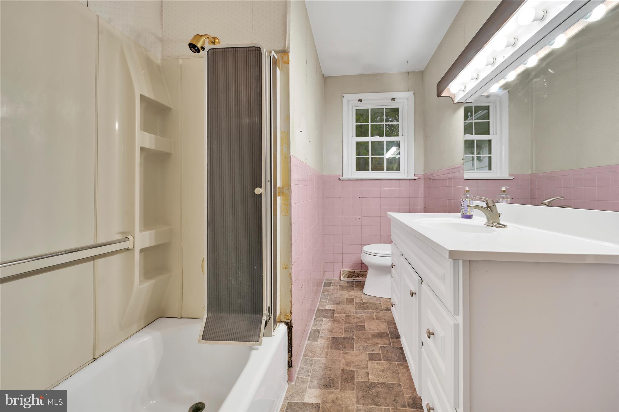 444 North Heidelberg Road Robesonia, PA 19551 - Photo 26 of 59 a bathroom with a sink a mirror and a shower