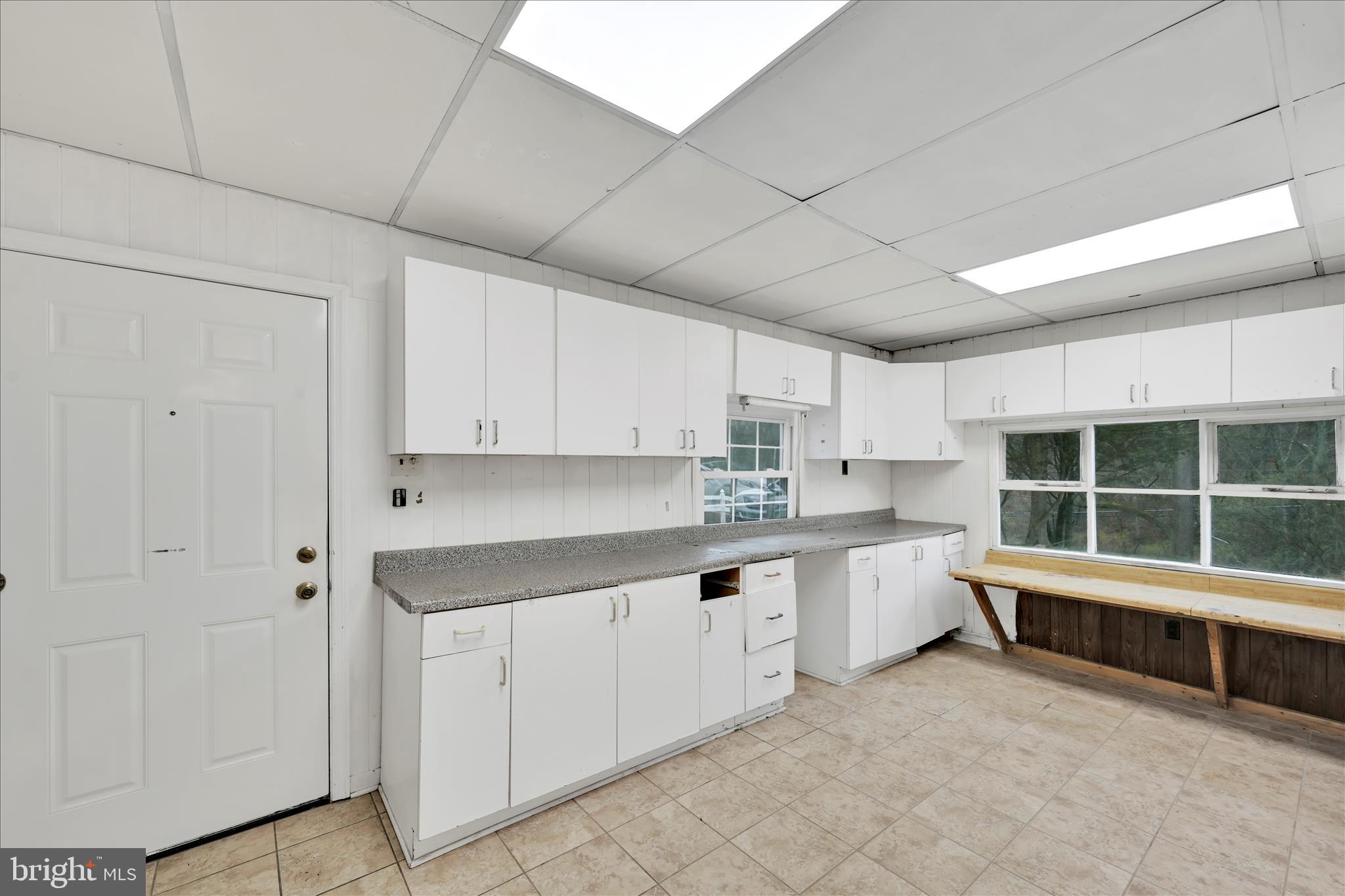 444 North Heidelberg Road Robesonia, PA 19551 - Photo 27 of 59 a kitchen with granite countertop white cabinets and sink