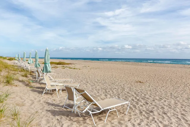a view of a patio near an ocean
