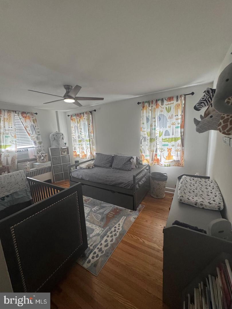 2431 North 50th Street Philadelphia, PA 19131 - Photo 11 of 15 a living room with furniture and a window