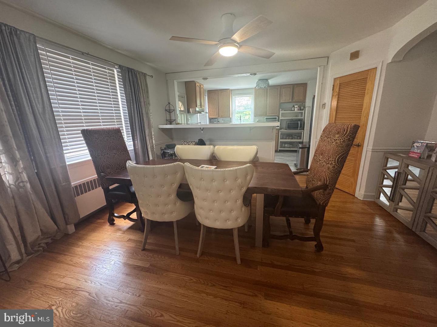 2431 North 50th Street Philadelphia, PA 19131 - Photo 6 of 15 a view of a dining room with furniture window and wooden floor