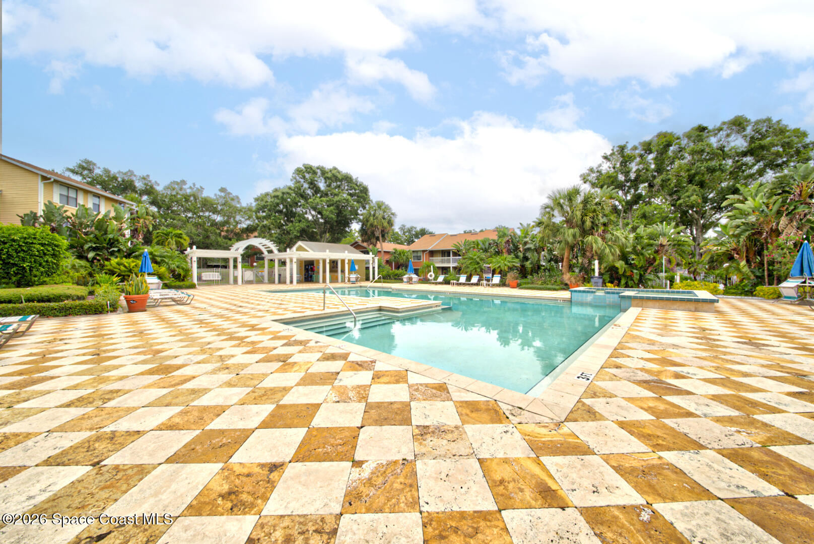 225 South Tropical Trail, Unit 605 Merritt Island, FL 32952 - Photo 22 of 36 Sunset Bay community pool