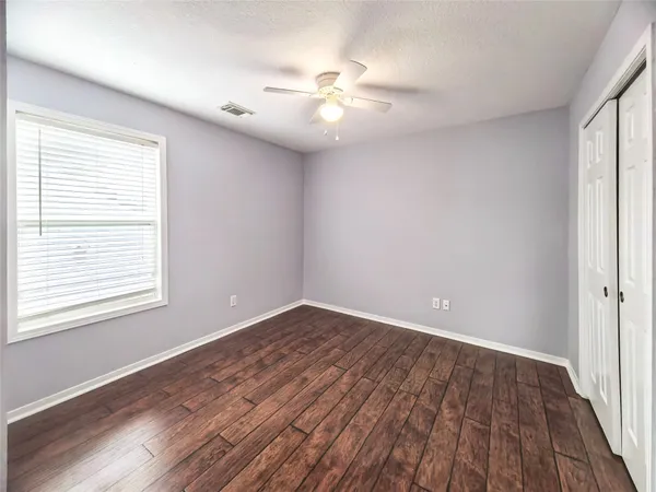 a bathroom with a sink vanity and a mirror