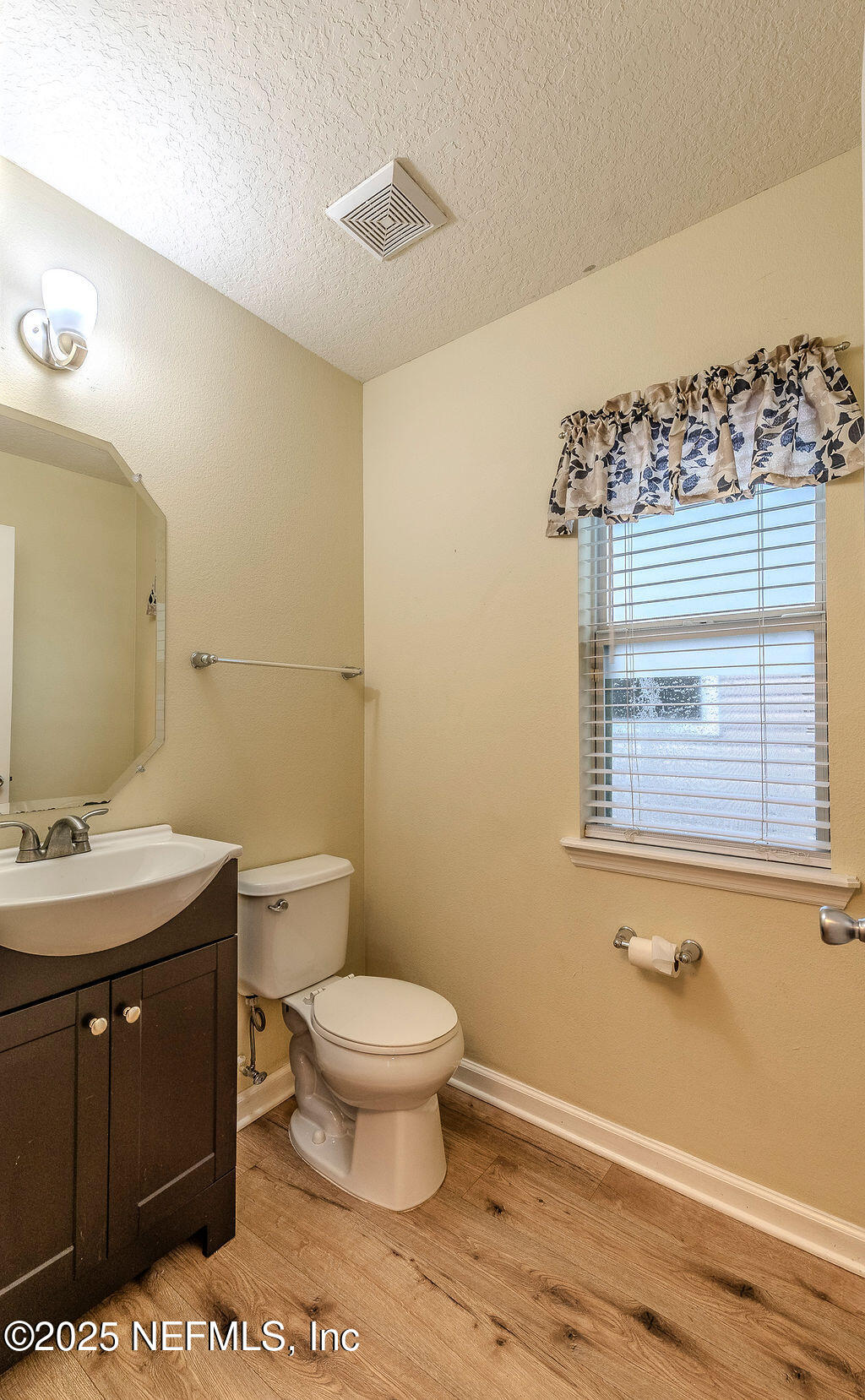 348 Auburn Oaks Road East Jacksonville, FL 32218 - Photo 11 of 30 a bathroom with a granite countertop toilet and sink