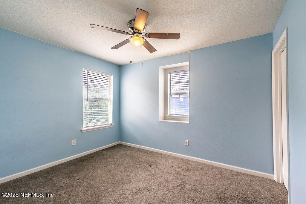 348 Auburn Oaks Road East Jacksonville, FL 32218 - Photo 22 of 30 a view of an empty room with a window