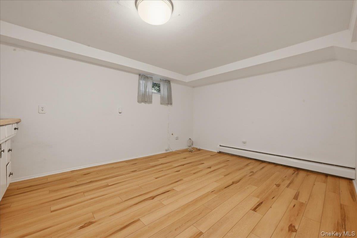 17 Avon Road Farmingdale, NY 11735 - Photo 30 of 46 a view of empty room with wooden floor